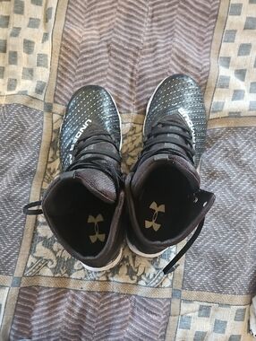 Under Armour Men's Black High-Top Football Cleats with White Accents